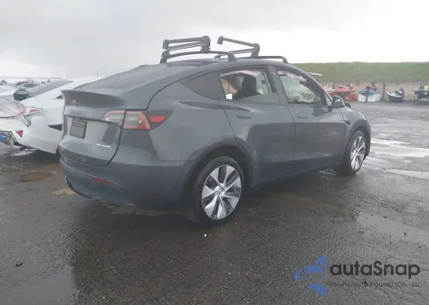 2023 Tesla Model Y из США, поврежденный, VIN 7SAYGDEE5PA128983